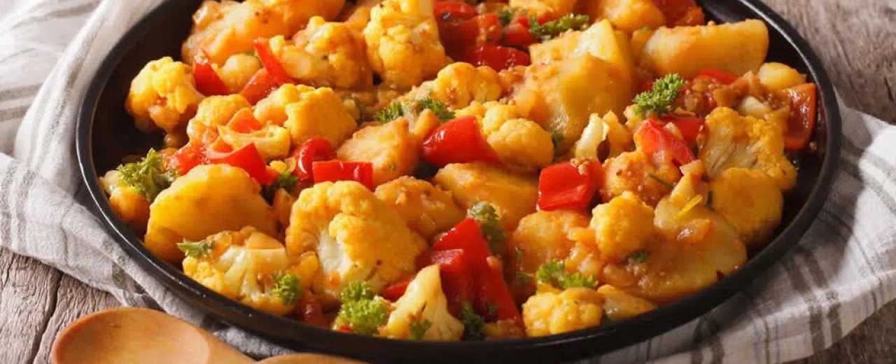 Bacalao con tomate y coliflor